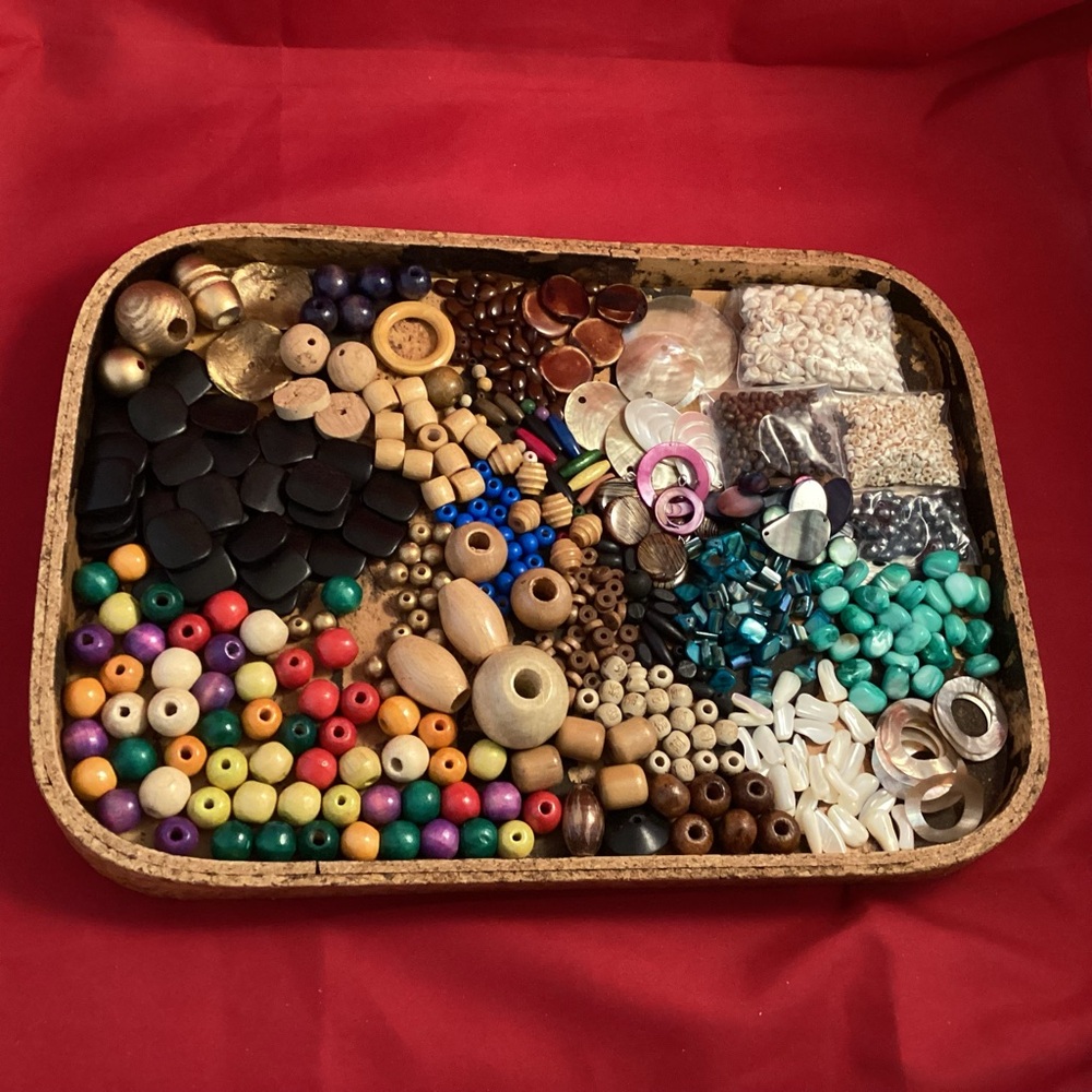 Mostly wood shells and Motherpearl beads lot